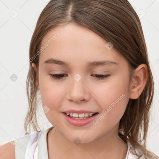 Joyful white child female with medium  brown hair and brown eyes