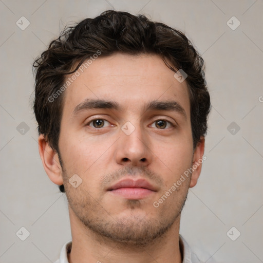 Neutral white young-adult male with short  brown hair and brown eyes