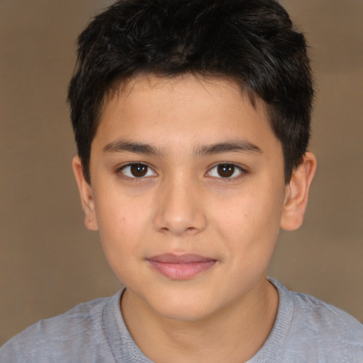 Joyful white child male with short  brown hair and brown eyes