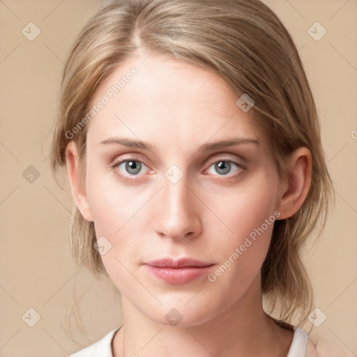 Neutral white young-adult female with medium  brown hair and blue eyes