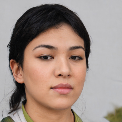Neutral asian young-adult female with medium  brown hair and brown eyes