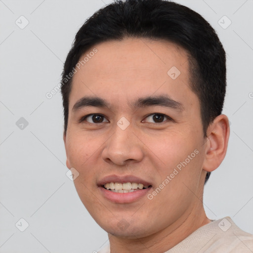 Joyful white young-adult male with short  black hair and brown eyes