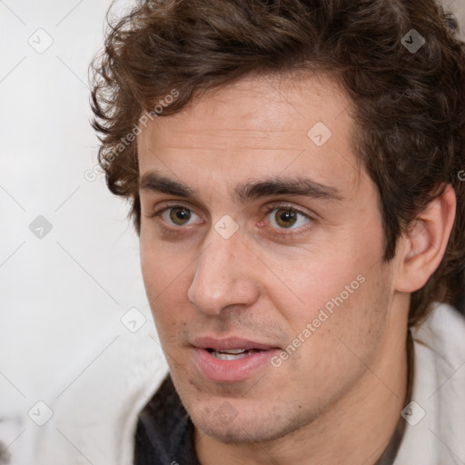 Neutral white adult male with short  brown hair and brown eyes