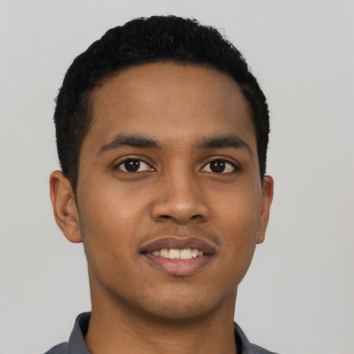 Neutral black young-adult male with short  black hair and brown eyes
