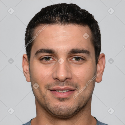 Joyful white young-adult male with short  brown hair and brown eyes