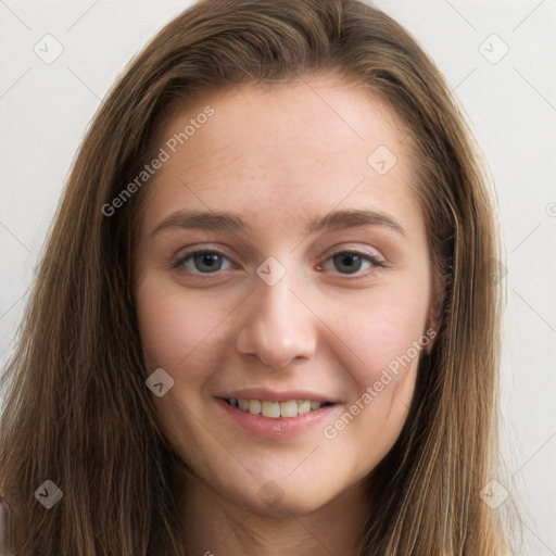 Joyful white young-adult female with long  brown hair and grey eyes