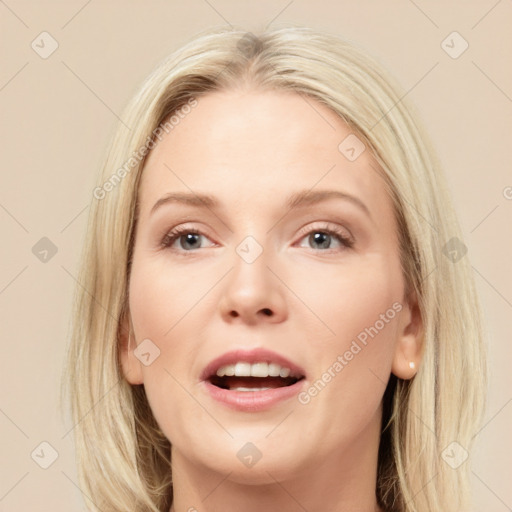 Joyful white young-adult female with medium  brown hair and blue eyes