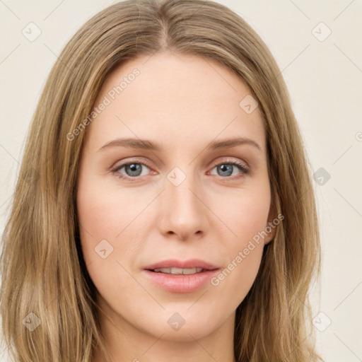 Joyful white young-adult female with long  brown hair and green eyes