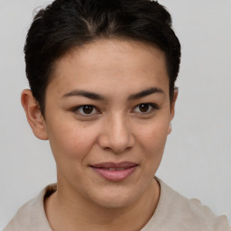 Joyful latino young-adult female with short  brown hair and brown eyes