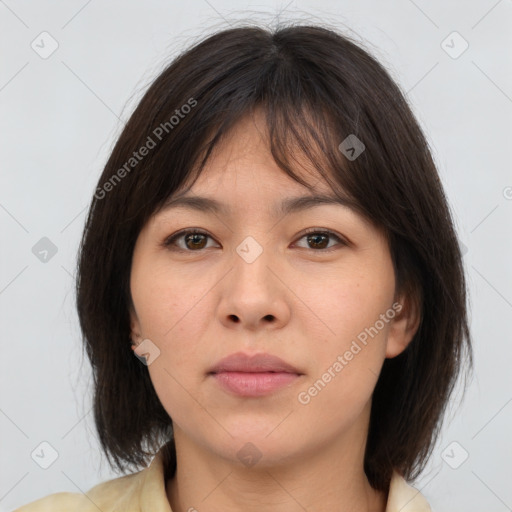 Neutral asian young-adult female with medium  brown hair and brown eyes