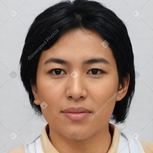 Joyful asian young-adult female with medium  black hair and brown eyes