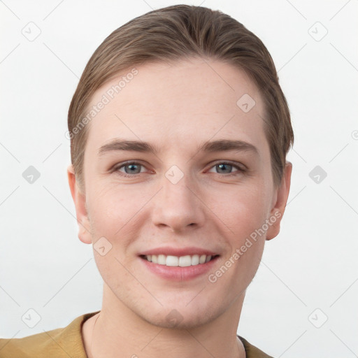 Joyful white young-adult female with short  brown hair and grey eyes