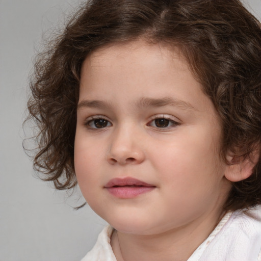 Neutral white child female with medium  brown hair and brown eyes