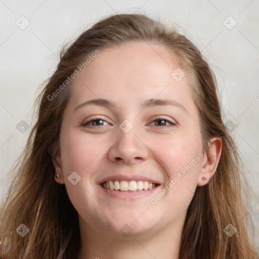 Joyful white young-adult female with long  brown hair and grey eyes