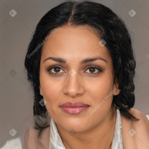 Joyful latino young-adult female with medium  brown hair and brown eyes