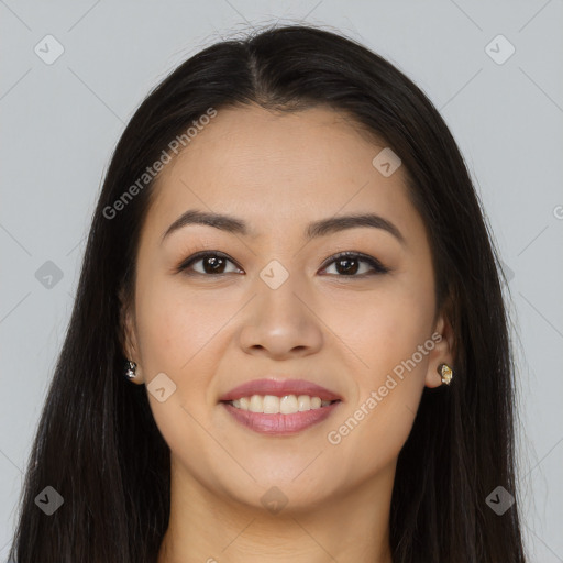 Joyful asian young-adult female with long  brown hair and brown eyes