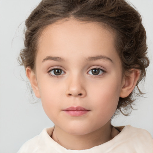 Neutral white child female with medium  brown hair and brown eyes