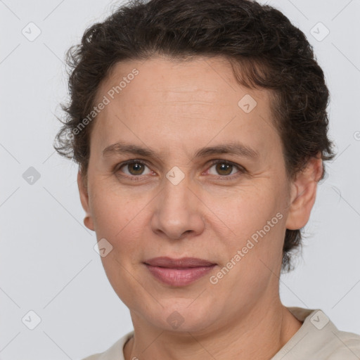 Joyful white adult female with short  brown hair and brown eyes