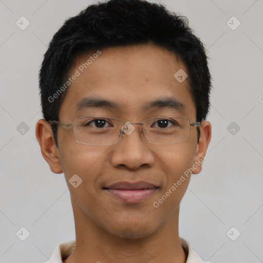 Joyful asian young-adult male with short  black hair and brown eyes