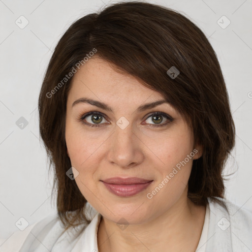 Joyful white young-adult female with medium  brown hair and green eyes