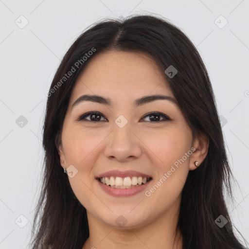 Joyful asian young-adult female with long  brown hair and brown eyes