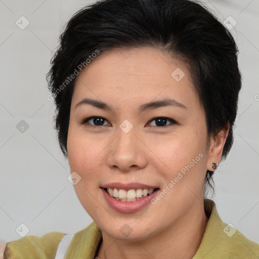 Joyful asian young-adult female with medium  brown hair and brown eyes