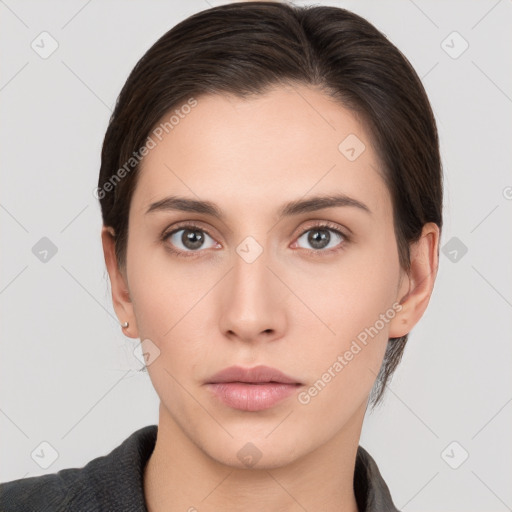 Neutral white young-adult female with short  brown hair and brown eyes