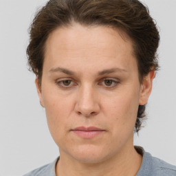 Neutral white adult female with short  brown hair and grey eyes