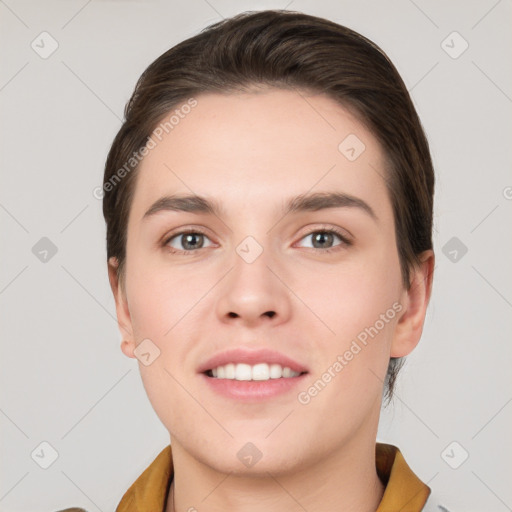 Joyful white young-adult female with short  brown hair and brown eyes