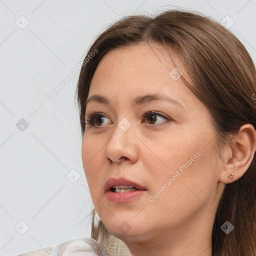 Neutral white young-adult female with medium  brown hair and brown eyes