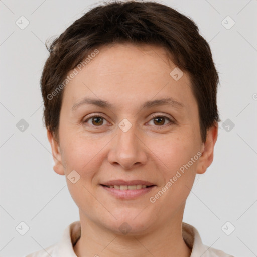 Joyful white young-adult female with short  brown hair and brown eyes