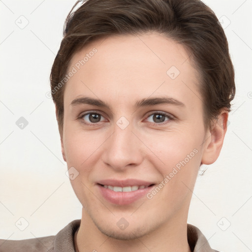 Joyful white young-adult female with short  brown hair and brown eyes