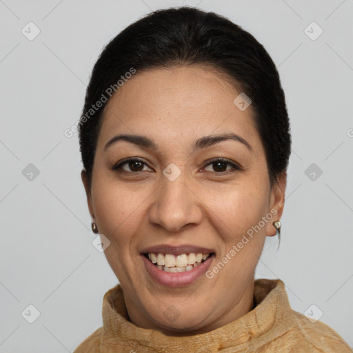 Joyful latino young-adult female with short  brown hair and brown eyes