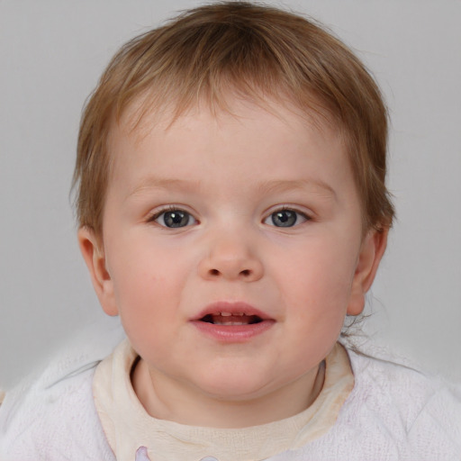 Joyful white child female with medium  brown hair and blue eyes