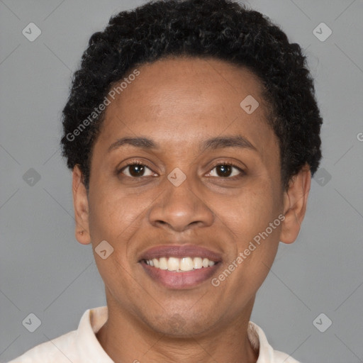 Joyful latino adult female with short  brown hair and brown eyes