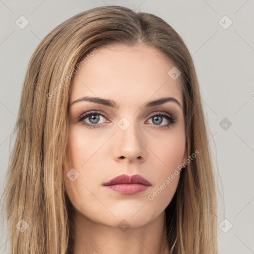 Neutral white young-adult female with long  brown hair and brown eyes