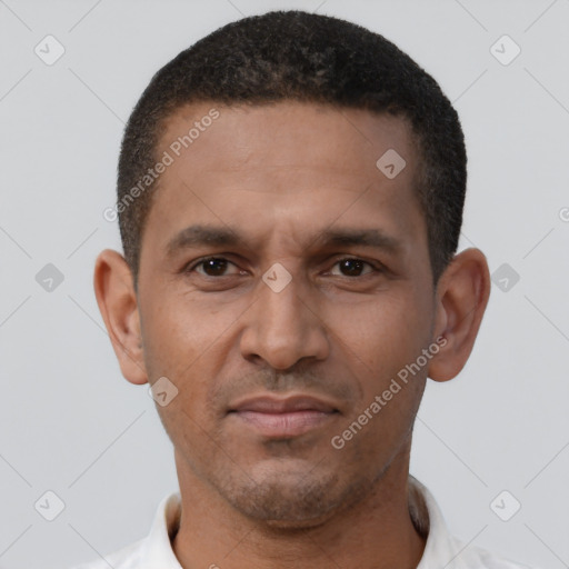 Neutral latino young-adult male with short  brown hair and brown eyes