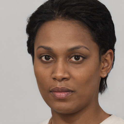 Neutral black young-adult female with short  black hair and brown eyes