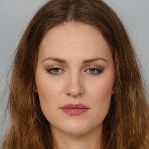 Neutral white young-adult female with long  brown hair and brown eyes