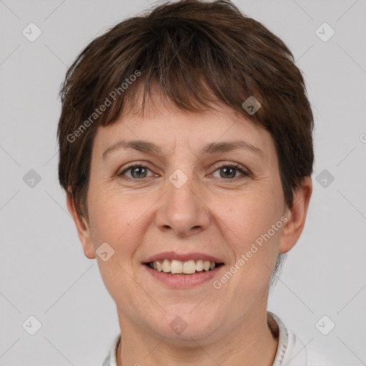 Joyful white adult female with short  brown hair and brown eyes