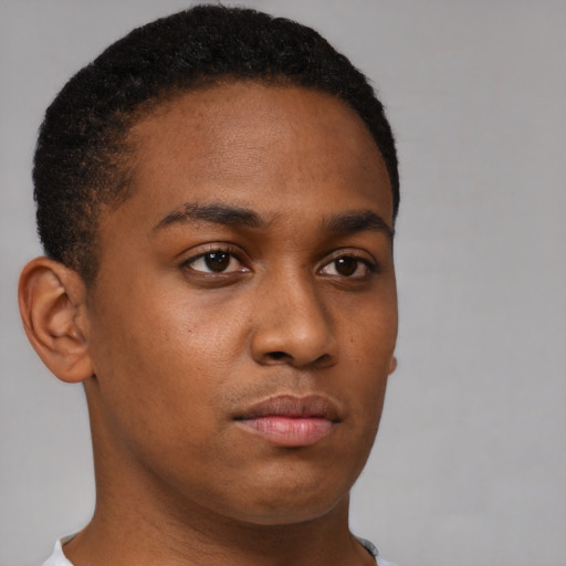 Neutral black young-adult male with short  brown hair and brown eyes