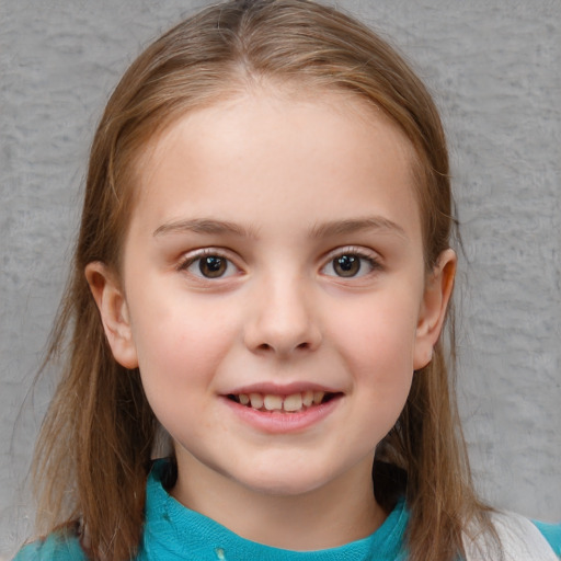 Joyful white child female with medium  brown hair and blue eyes