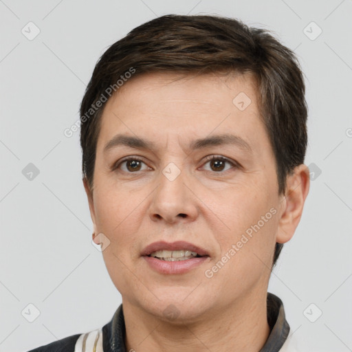 Joyful white adult female with short  brown hair and brown eyes