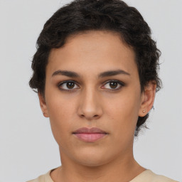 Neutral white young-adult female with short  brown hair and brown eyes