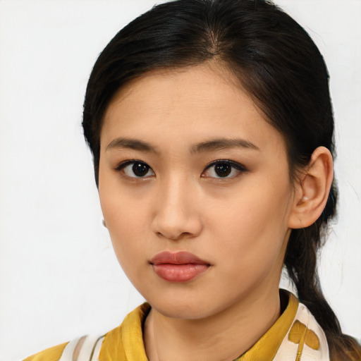 Neutral asian young-adult female with medium  brown hair and brown eyes