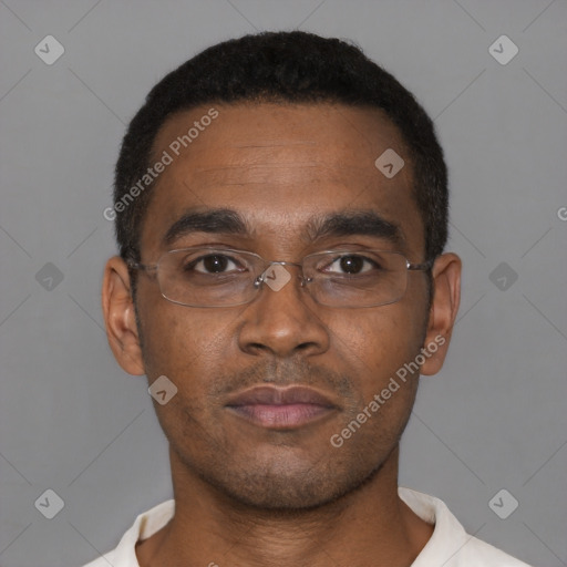 Neutral black young-adult male with short  black hair and brown eyes