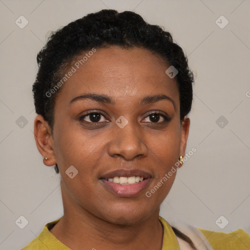 Joyful black young-adult female with short  brown hair and brown eyes
