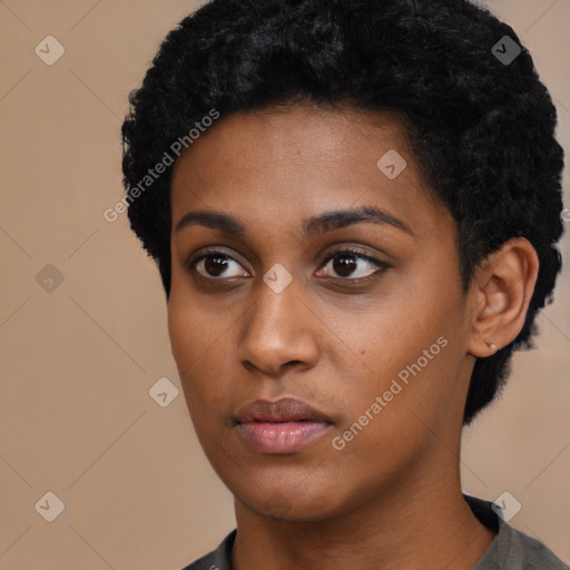 Neutral black young-adult female with short  black hair and brown eyes