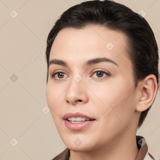 Joyful white young-adult female with short  brown hair and brown eyes