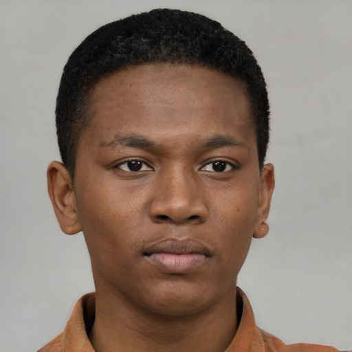 Neutral black young-adult male with short  brown hair and brown eyes